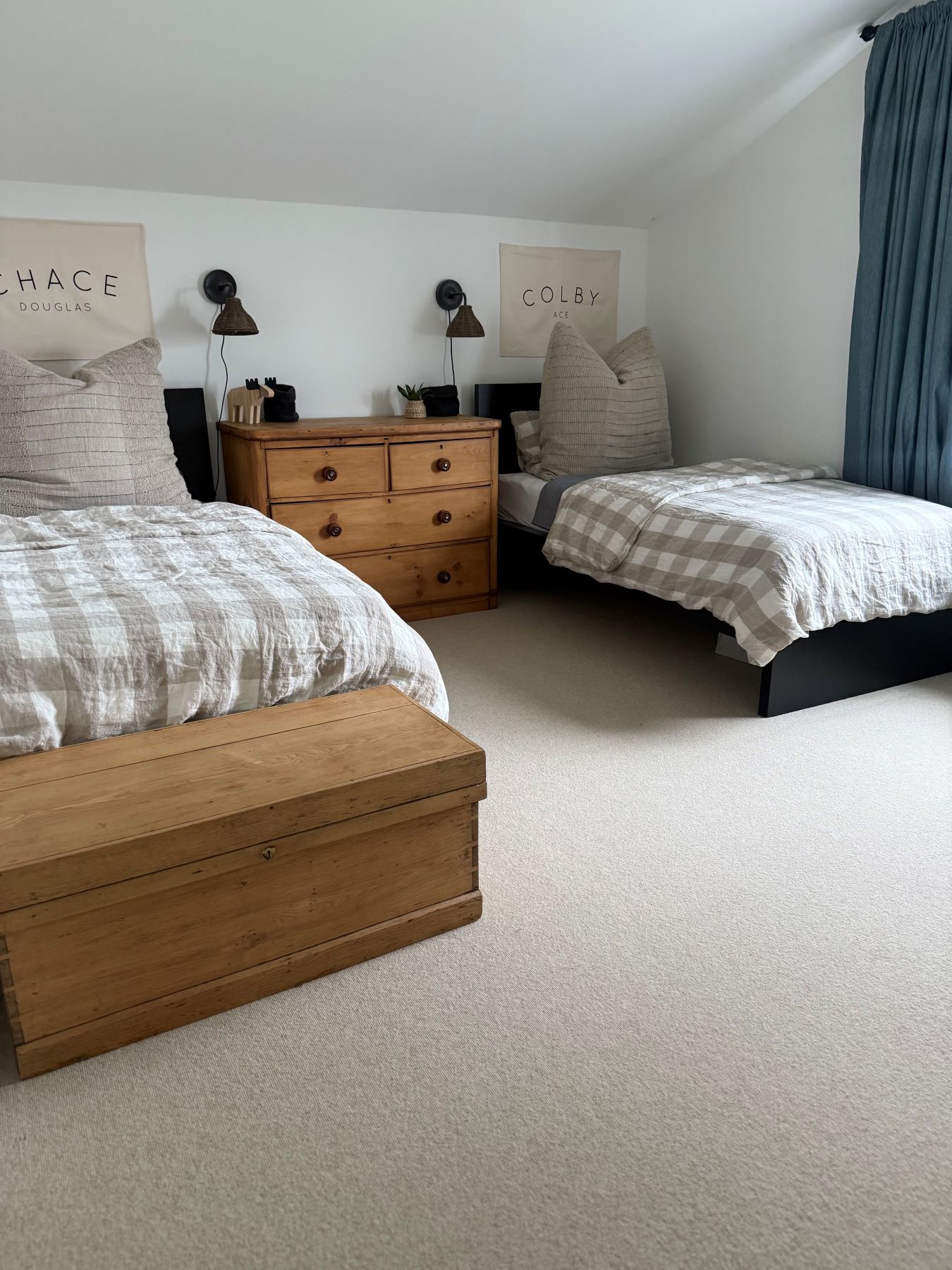 twin bedroom with a cream bedroom carpet